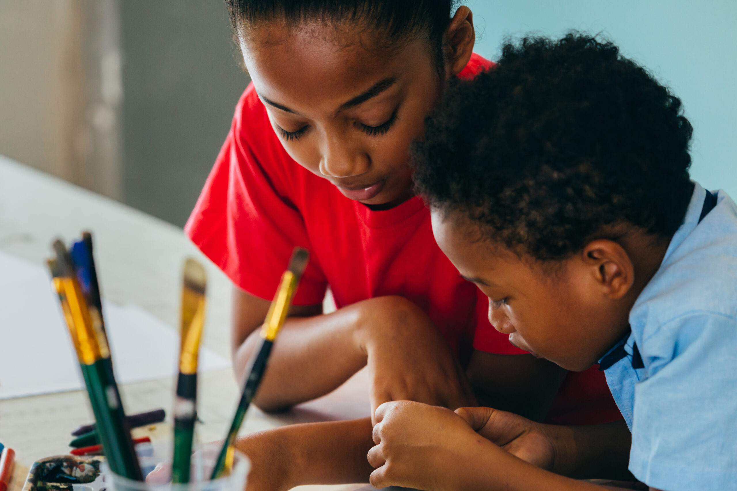 African American kids drawing and painting